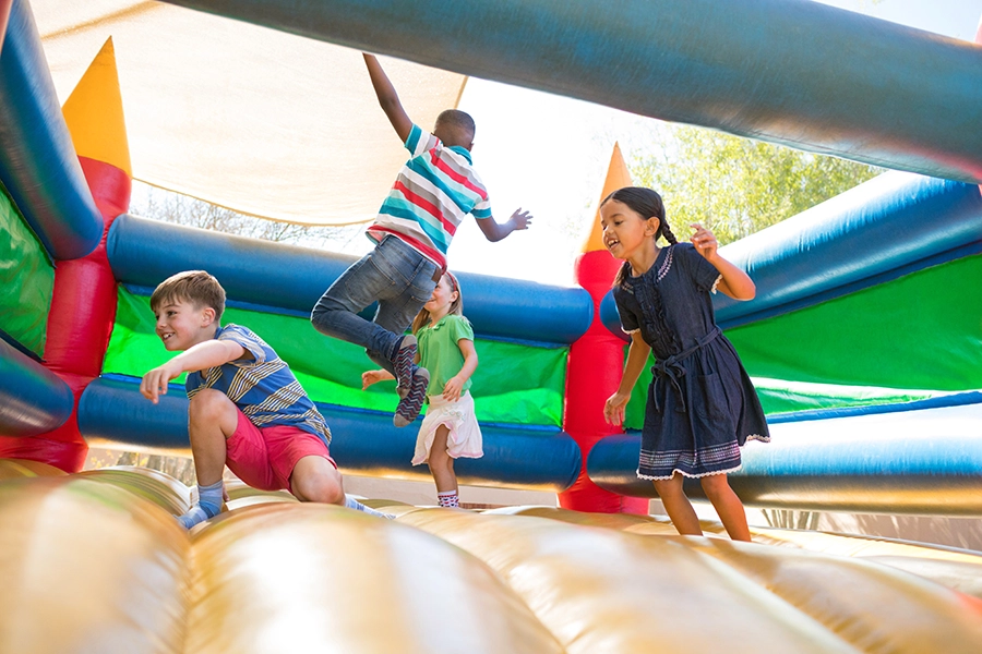 Kids having fun in a bounce house